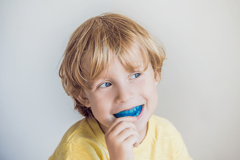 Child with mouthguard