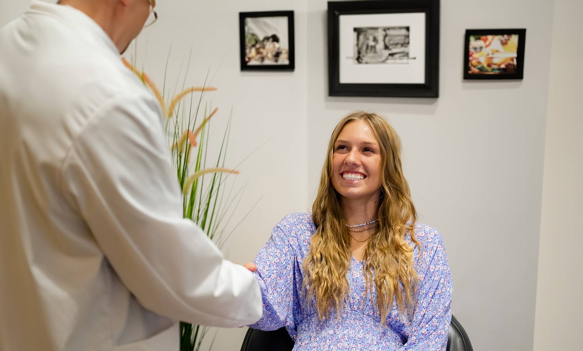 Team member helping patient